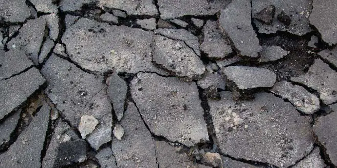 A close up of some rocks that are cracked